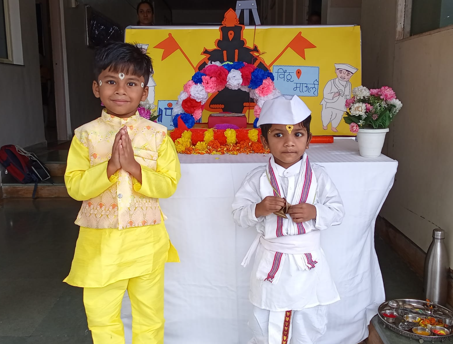 Two boys in traditional dress and Warkari attire for Ashadhi Ekadashi